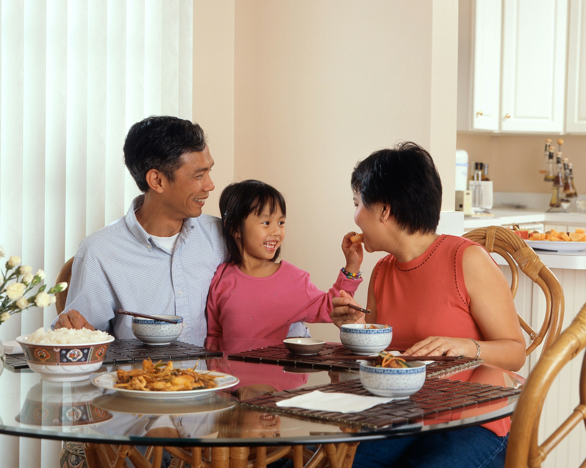 A family sharing a meal at the table