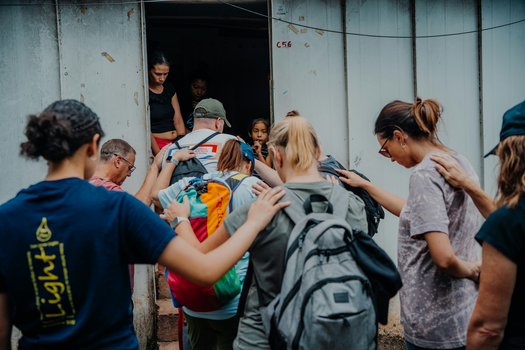 Community members gathered outside a building